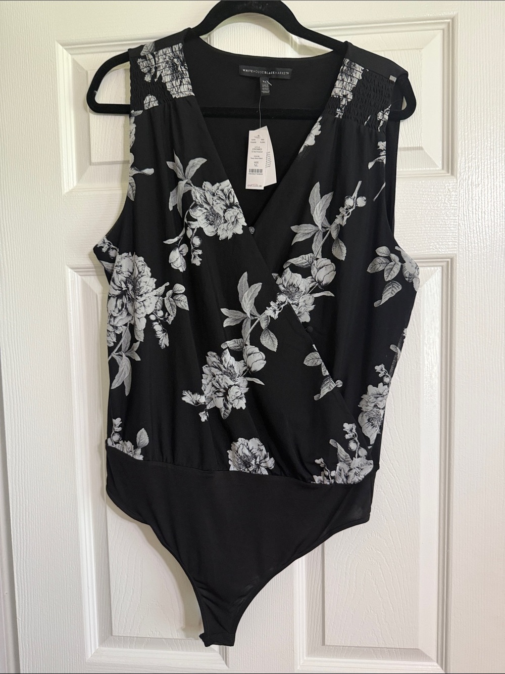 White House Black Market Black and White Floral Surplice Sleeveless Bodysuit